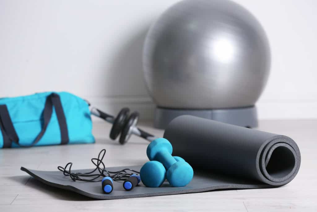 workout accessories on wood floor