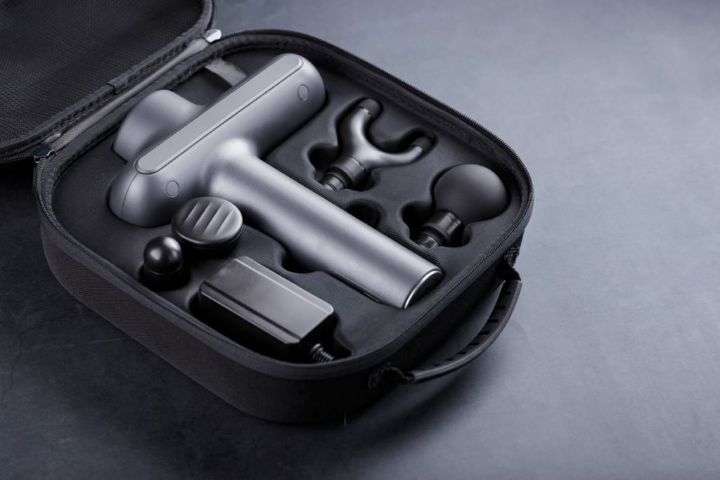 massage gun stored in its case