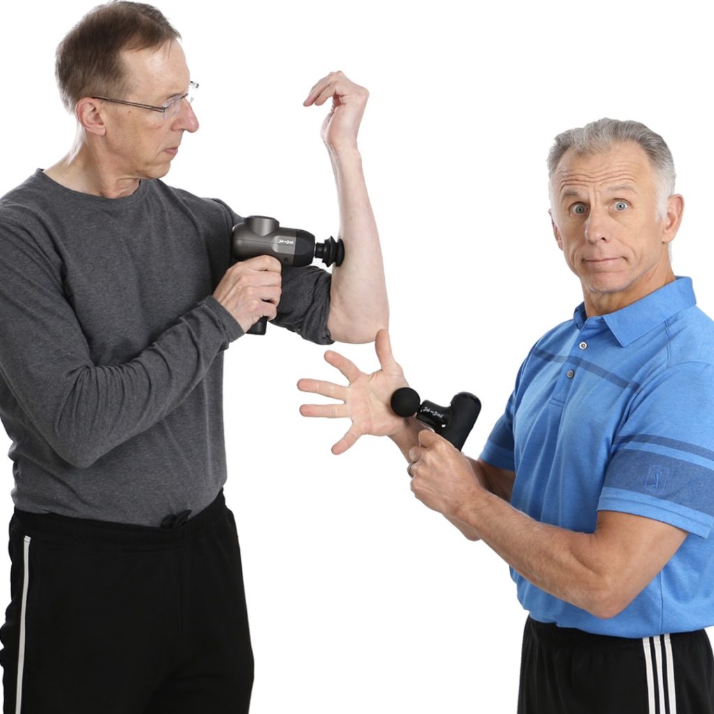 Bob and Brad holding Massage Gun